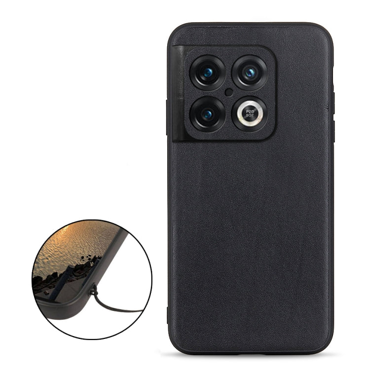 Black leather phone case with textured grain detail and camera cutouts.