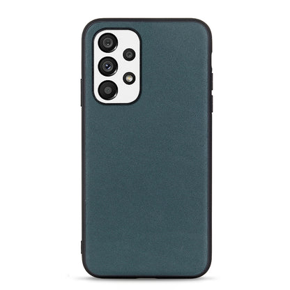 Teal green lambskin leather phone case with raised camera area and cutouts