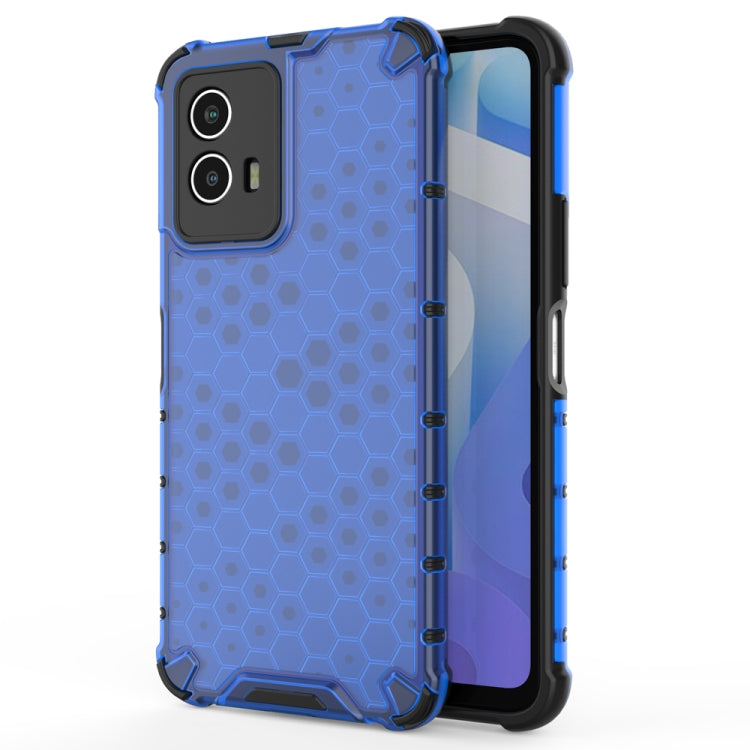 Blue shockproof phone case with honeycomb pattern, raised corners, and camera cutouts