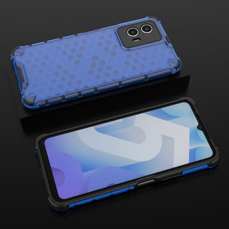 Blue honeycomb shockproof phone case shown front and back, with side grip accents