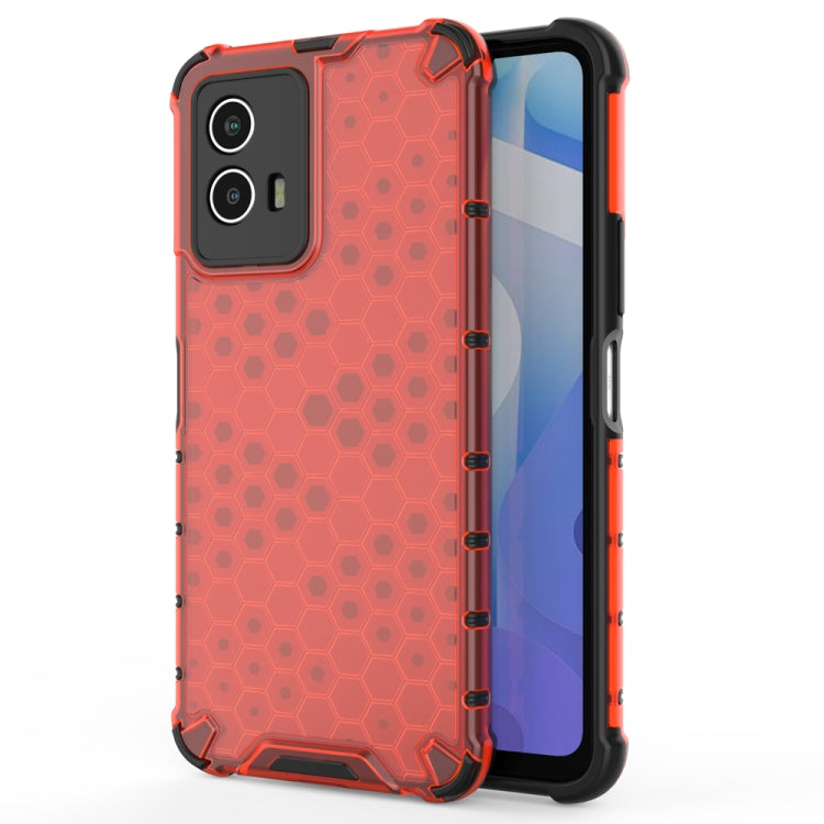 Red shockproof phone case with honeycomb pattern, raised corners, and camera cutouts
