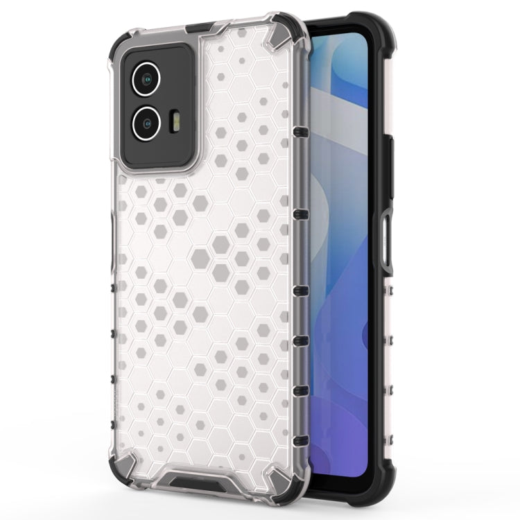 White shockproof phone case with honeycomb pattern, transparent sides, and camera cutouts