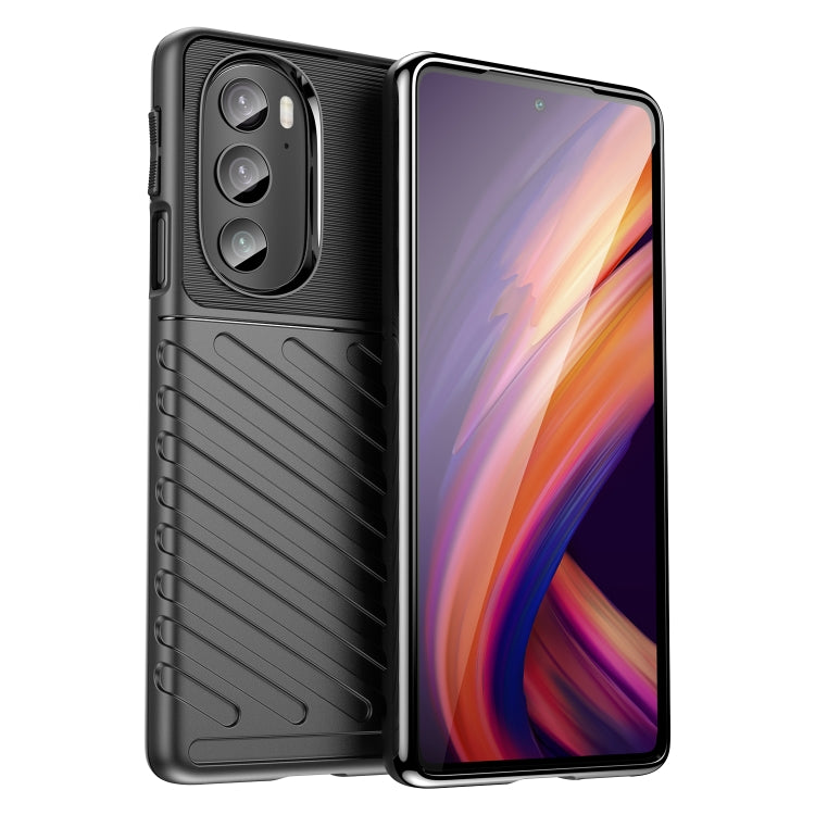 Black shockproof TPU phone case with textured grip and camera cutout