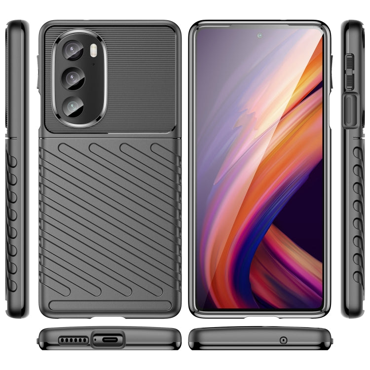 Dark shockproof TPU phone case, textured back with side buttons and camera cover