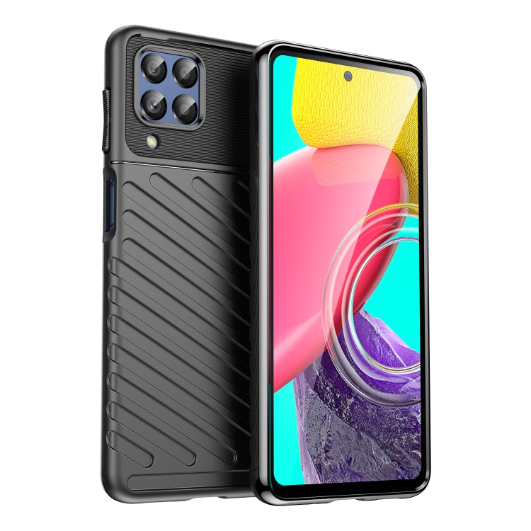 Black shockproof TPU phone case with textured back, camera lens cutouts, and buttons