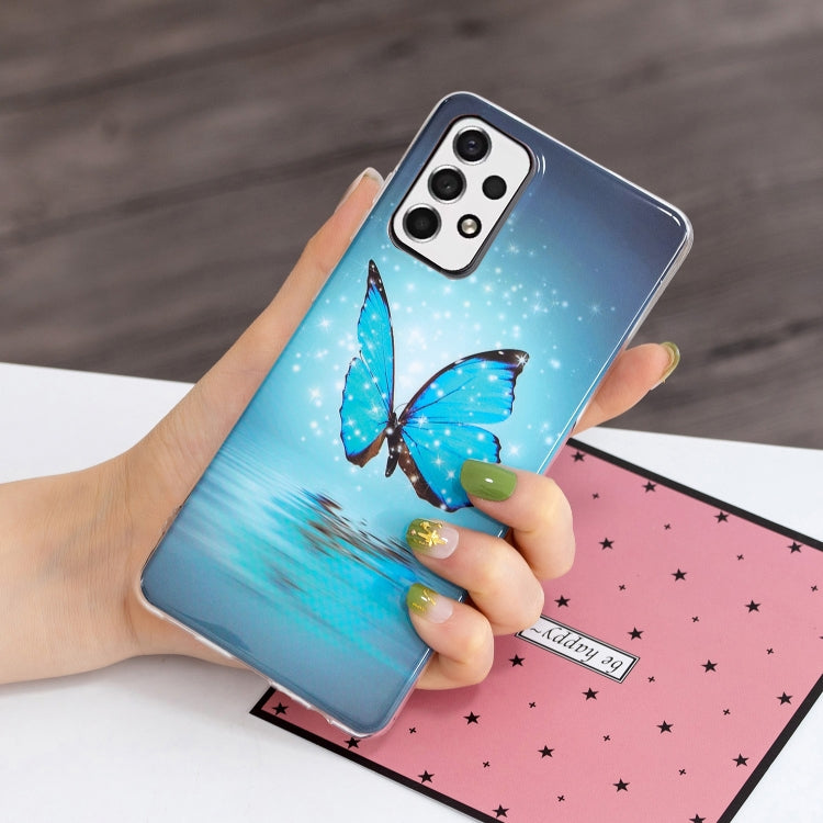 Luminous TPU phone case with blue butterfly print, protective clear frame and camera cutouts
