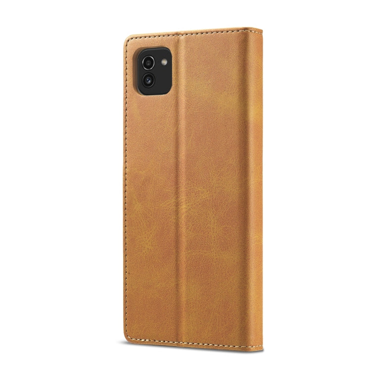Brown leather phone folio case with camera cutout, smooth back cover.