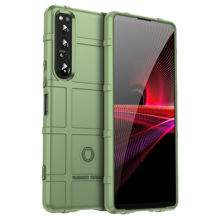 Green rugged TPU phone case with camera cutout and protective bumper around edges