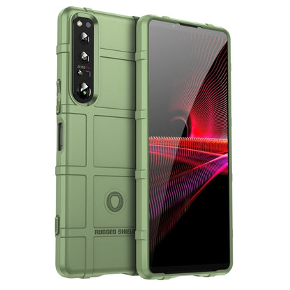 Green rugged TPU phone case with camera cutout and protective bumper around edges