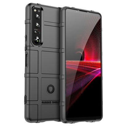 Dark gray shockproof TPU phone case with raised edges and camera cutouts