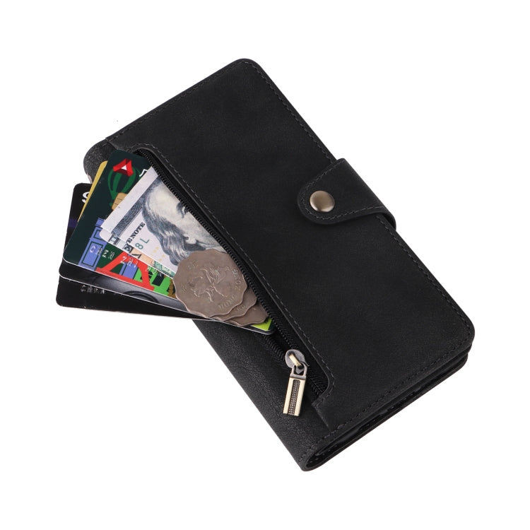 Black leather phone wallet case with card slots and wrist strap, partially open.