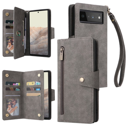 Grey three-fold leather phone case with card slots, snap button closure, and wrist strap.