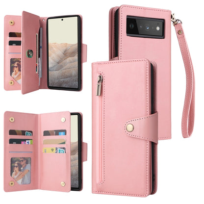 Pink three-fold leather phone case with card slots, snap button closure, and wrist strap.