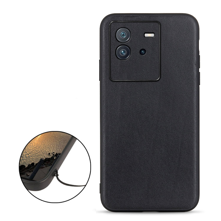 Black genuine leather phone case with camera cutout and raised edge protection