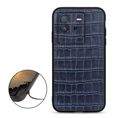 Blue crocodile-texture leather phone case with camera cutouts and small opening