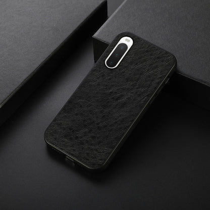 Black textured leather phone case, slim fit with camera cutout and side buttons