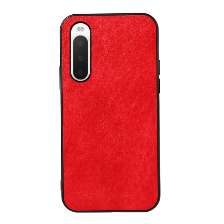 Red textured leather phone case with camera cutout and shockproof outer edges
