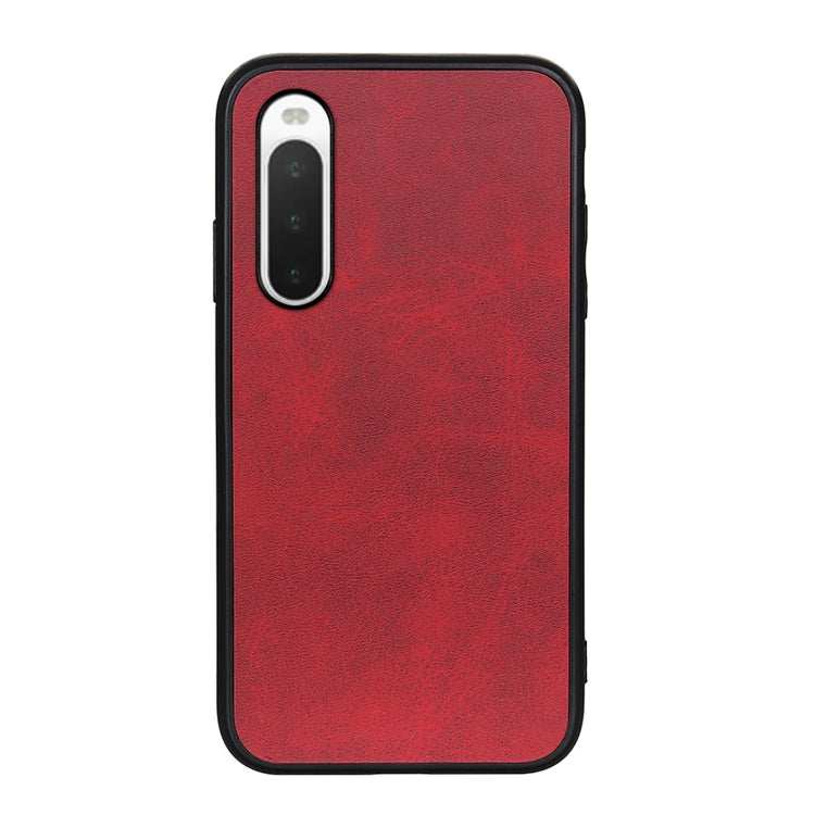 Red cowhide-texture PU shockproof phone case with cutouts for camera and ports.