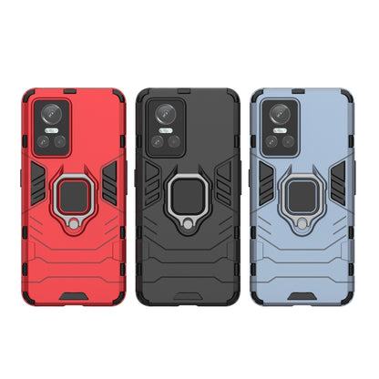 Shockproof phone cases set in red, black, and light blue with TPU holder rings.