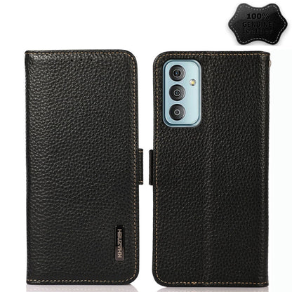 Black litchi leather flip phone case with camera cutout and side magnetic closure.