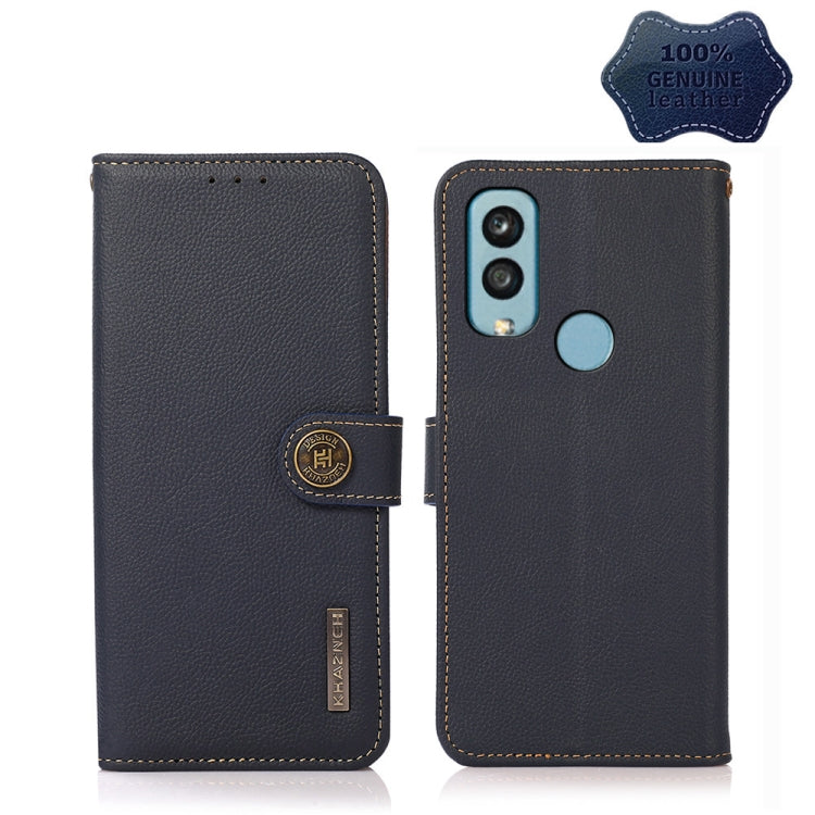 Dark leather flip phone case with side strap; back shows dual camera cutout and oval button
