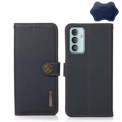 Dark leather flip phone case with side strap; back shows triple camera cutout and oval button