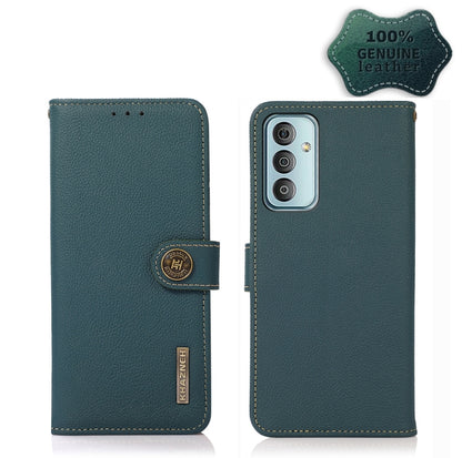 Green leather flip phone case with side strap; back shows triple camera cutout and oval button