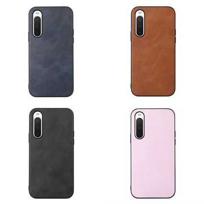 Cowhide-textured PU phone case set: blue, brown, black, and pink front views