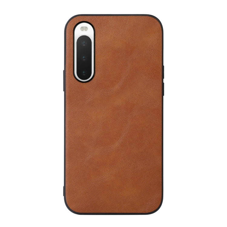 Brown cowhide-textured PU phone case with front camera cutout and side openings