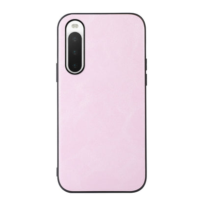 Pink cowhide-textured PU phone case with front camera cutout and side openings