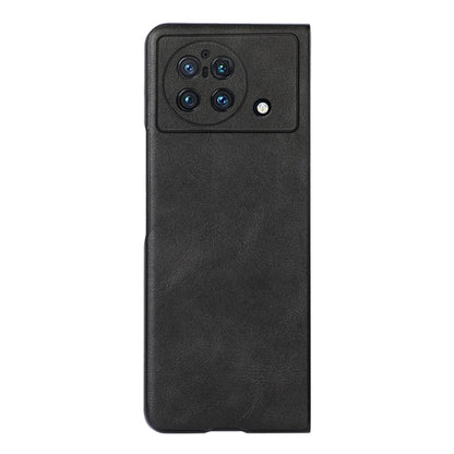 Black cowhide-textured PU phone case with camera module cutout and speaker port