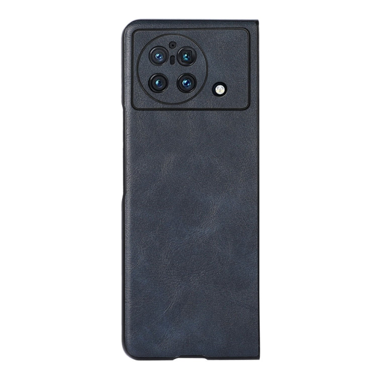 Dark blue cowhide-textured PU phone case with camera module cutout and speaker port