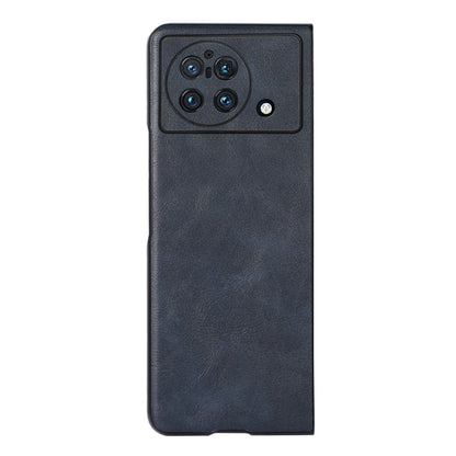 Dark blue cowhide-textured PU phone case with camera module cutout and speaker port