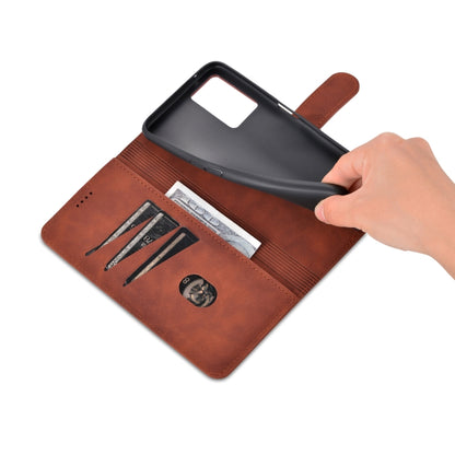 Brown leather wallet-style flip case with hand inserting cards and side holder