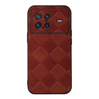 Brown PU phone case with quilted plaid pattern, camera cutout and side button openings