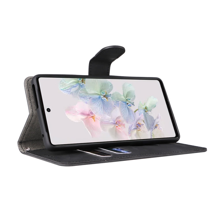 Black magnetic flip leather phone case holding a phone with folio cover