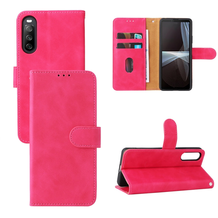 Pink magnetic flip leather phone case with card slots and fold-out stand
