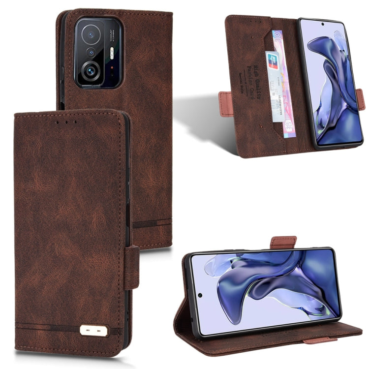 Brown leather folio phone case with magnetic clasp, card slots, and kickstand support