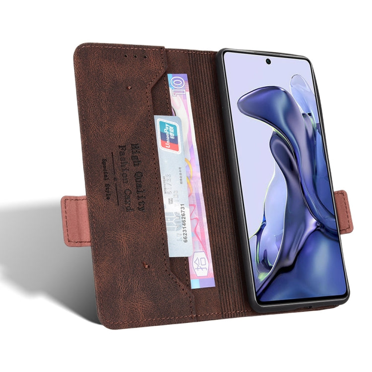 Brown leather flip phone case with card slots and magnetic clasp closure