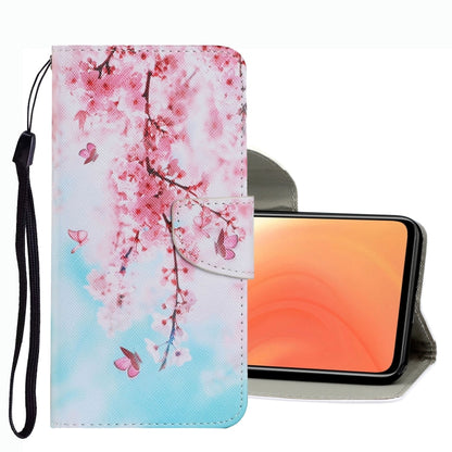 Floral drawing leather phone case with pink and blue blossoms, card slot and wrist strap.