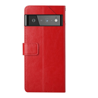 Red leather flip phone case with camera window and front strap-style closure