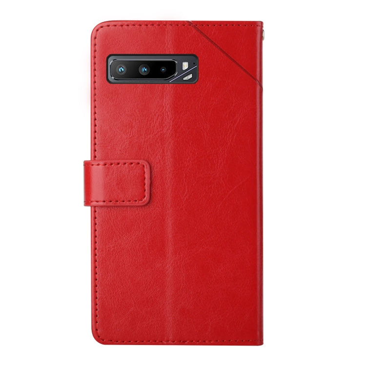 Red flip leather phone case with camera cutout and fold-over strap closure