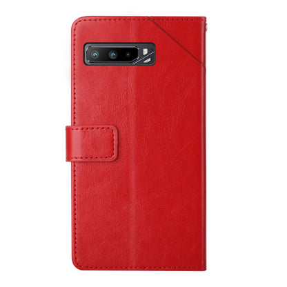 Red flip leather phone case with camera cutout and fold-over strap closure