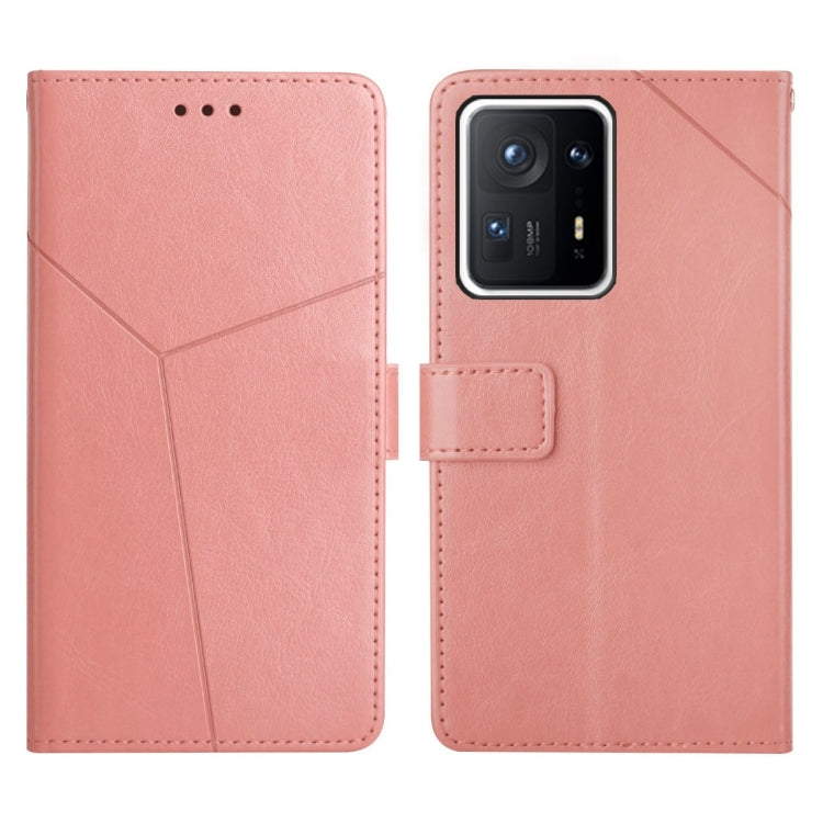 Rose pink leather flip phone case with stitched diagonal pattern and camera cutout