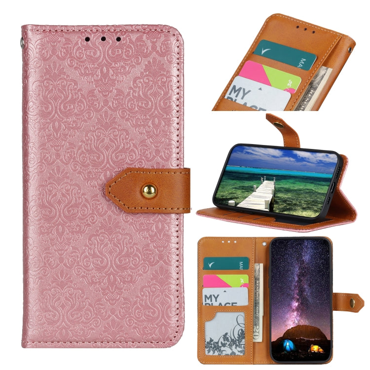 Embossed leather folio phone case with card slots and magnetic clasp; pink with brown strap.