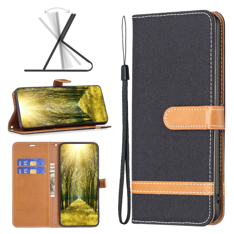 Denim-texture flip leather phone case with wrist strap, dark gray with tan stitching