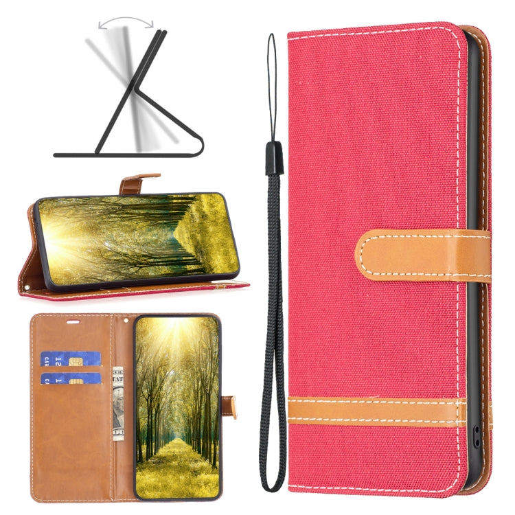 Denim-texture flip leather phone case with wrist strap, red with tan stitching