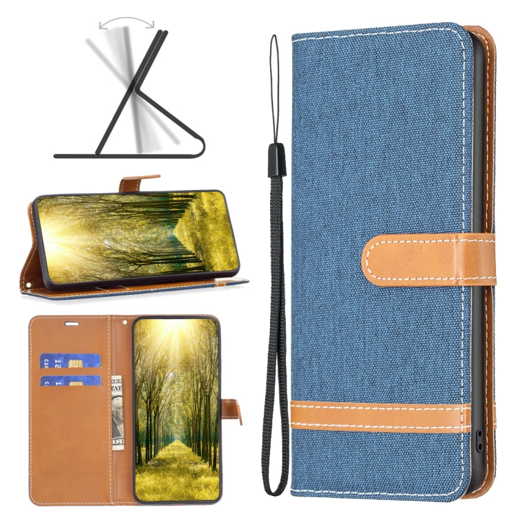Denim-texture flip leather phone case with wrist strap, blue with tan stitching