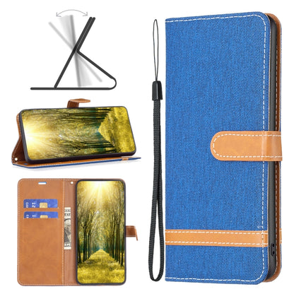 Denim-texture flip leather phone case with wrist strap, bright blue with tan stitching