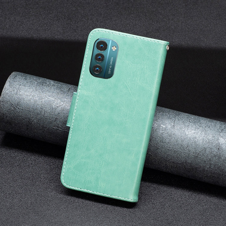 Mint green PU leather phone flip case with camera cutout and stitched edges